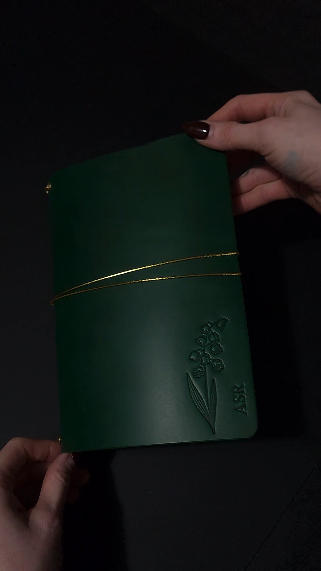 Oxblood trifold journal cover with gold elastics (one cover, no paper)