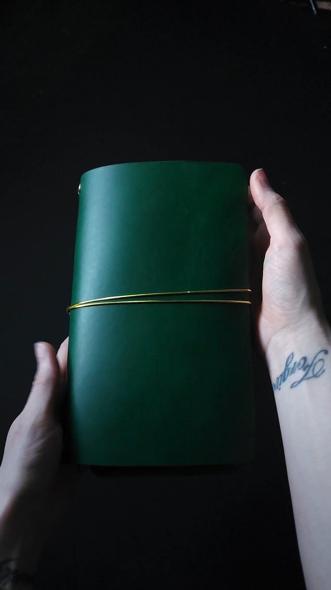 Oxblood trifold journal cover with gold elastics (one cover, no paper)