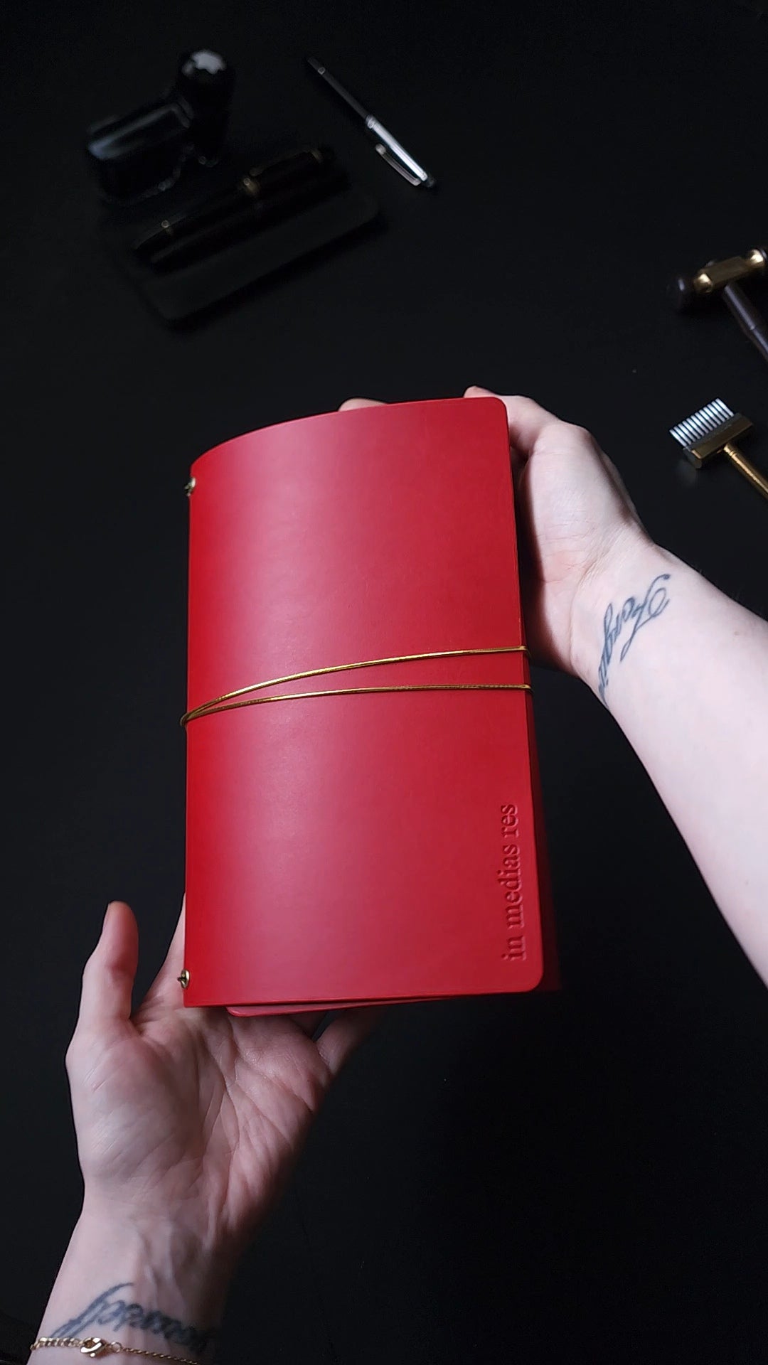 Oxblood trifold journal cover with gold elastics (one cover, no paper)