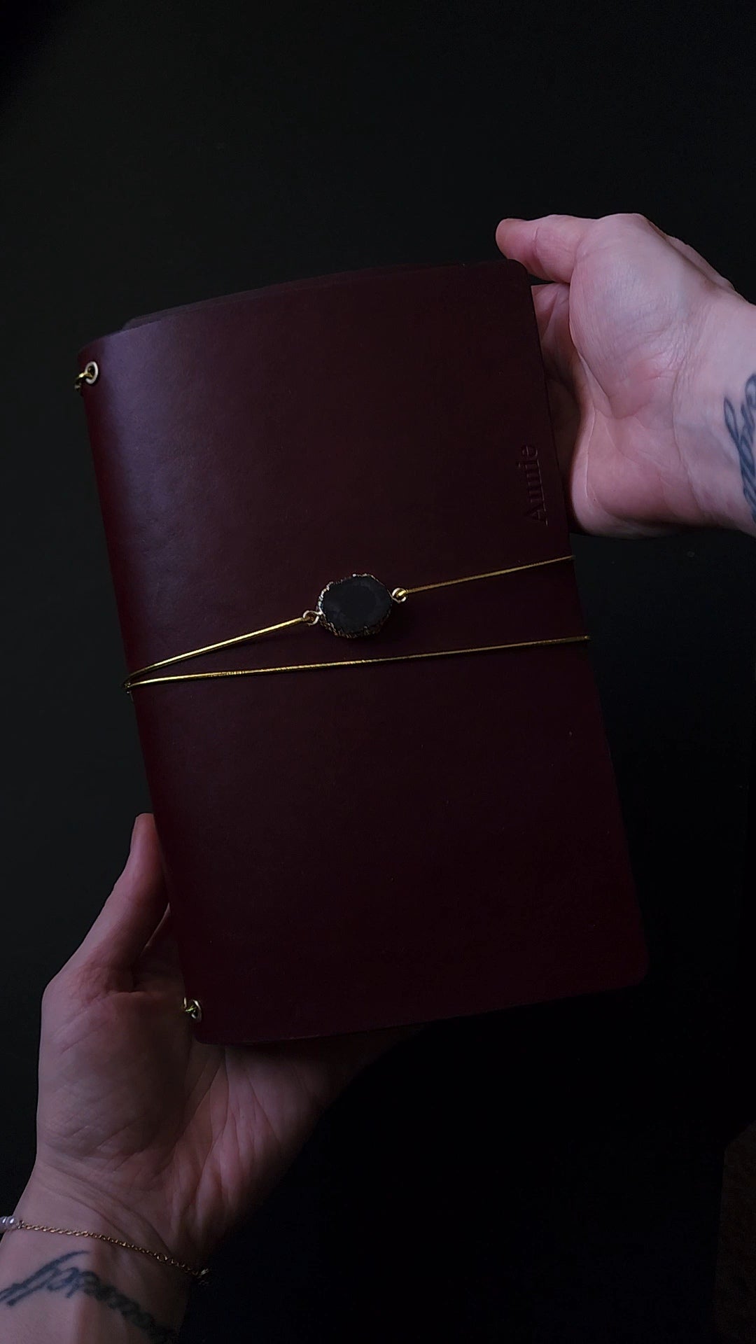 Oxblood trifold journal cover with gold elastics (one cover, no paper)