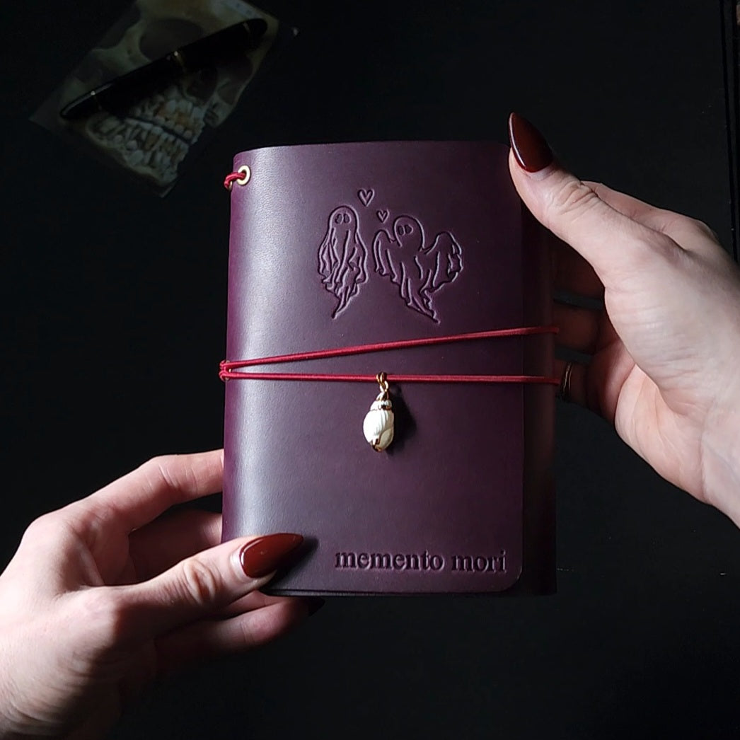 Trifold leather journal with back pocket & ghost couple