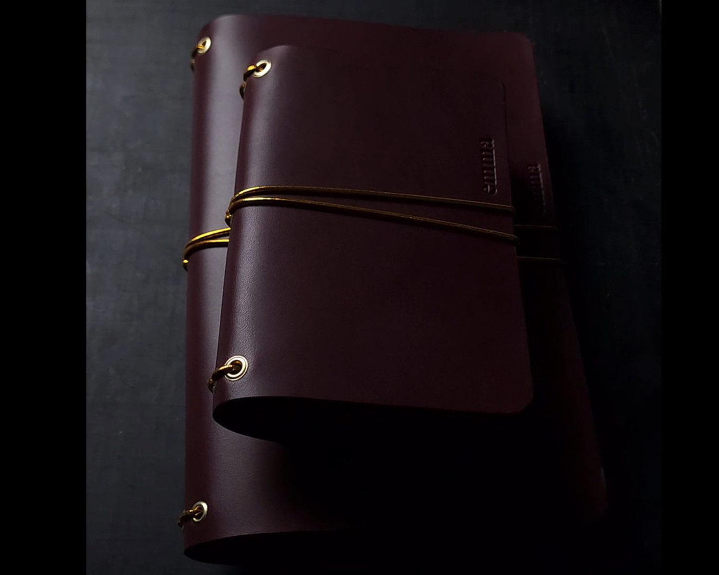 Oxblood trifold journal cover with gold elastics (one cover, no paper)