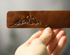 leather bookmark with mountains